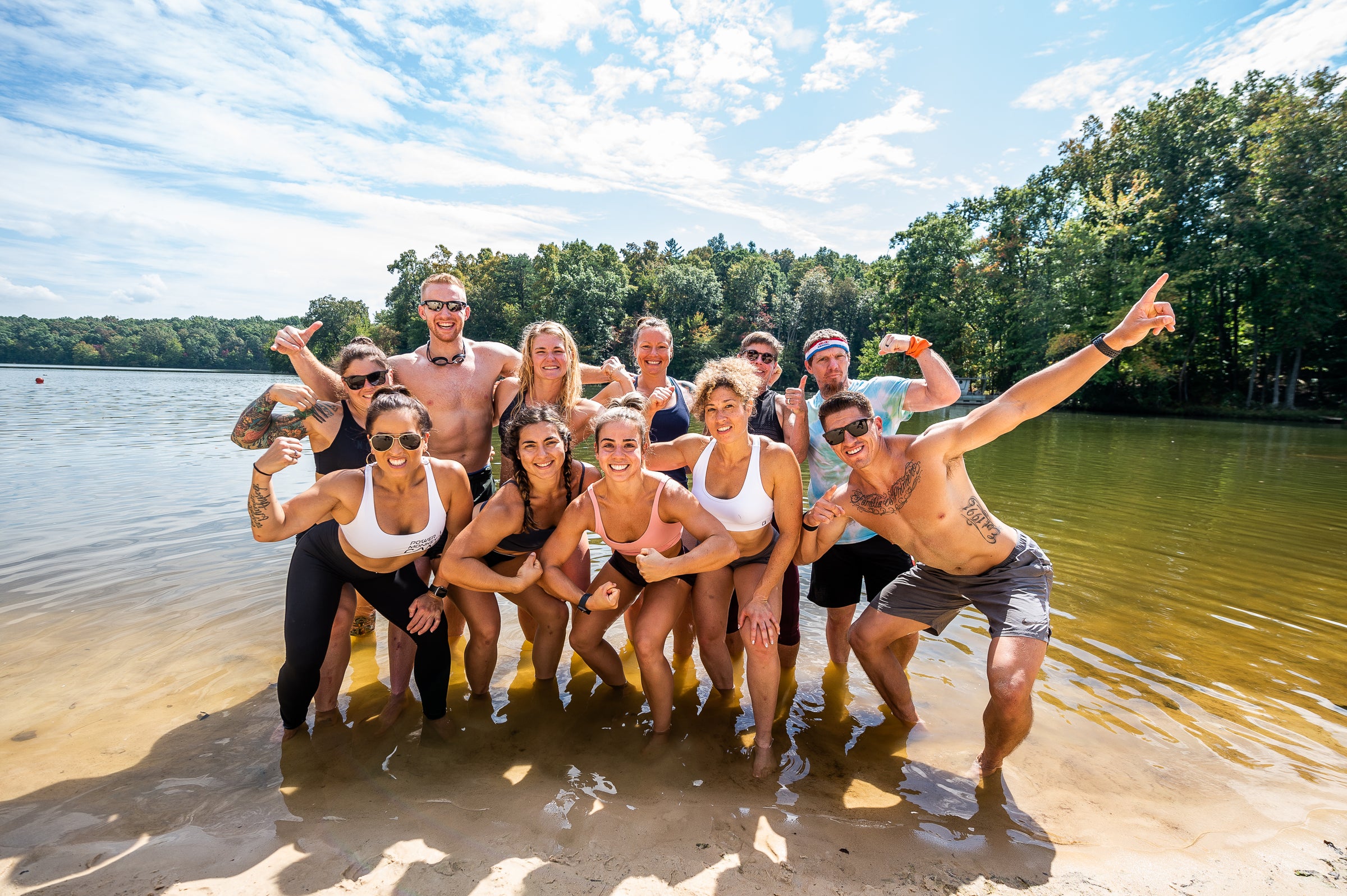 Photo of Power Monkey Campers celebrating by the lake at Power Monkey Camp.