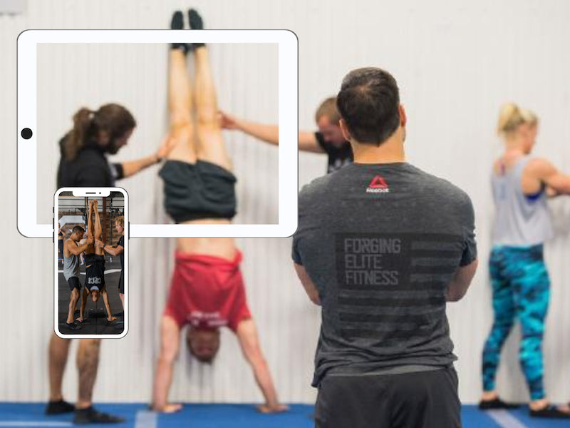 Dave Durante coaching the Handstand Station at Power Monkey Camp