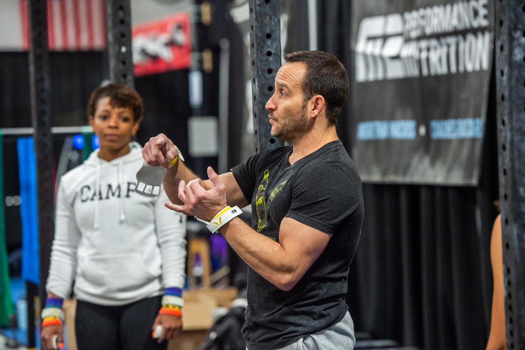 Photo of Shane DeFrietas coaching at the Bar Station at Power Monkey Camp.